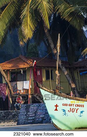 Stock Image - India, Fishing Boat At Sunset On Palolem Beach; Goa. Fotosearch