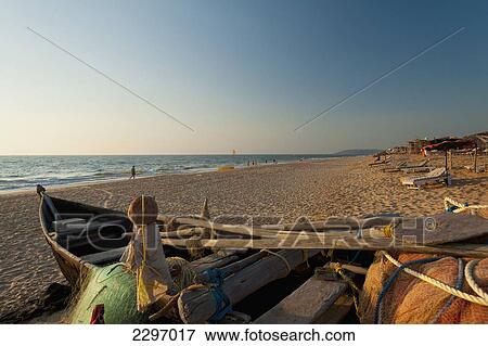 India, Goa, Fishing boat on beach; Candolim View Large Photo Image Stock Photo - India, Goa, Fishing boat on beach; Candolim. Fotosearch