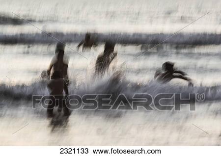 India, Karnataka, Blurry Figures In Crashing Waves At Gokarna Beach; Gokarna View Large Photo Image Stock Image - India, Karnataka, Blurry Figures In Crashing Waves At Gokarna Beach; Gokarna. Fotosearch