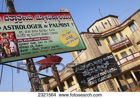 India, Karnataka, Commercial Sign For Astrologer And Palmist; Udupi View Large Photo Image Picture - India, Karnataka, Commercial Sign For Astrologer And Palmist; Udupi. Fotosearch