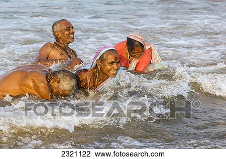 India, Karnataka, Indians Enjoying Sea After Pilgrimage; Gokarna View Large Photo Image Stock Image - India, Karnataka, Indians Enjoying Sea After Pilgrimage; Gokarna. Fotosearch