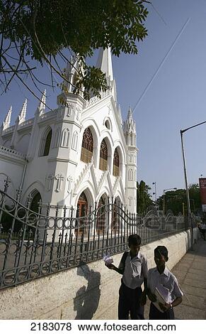 Stock Photo - India, Madras, Two local boys in front of San Thome Cathedral; Chennai. Fotosearch