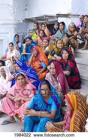 India, Mathura, Group Of Hindu Women In Colorful Sari And Veils Sitting On Steps. View Large Photo Image Stock Image - India, Mathura, Group Of Hindu Women In Colorful Sari And Veils Sitting On Steps.. Fotosearch