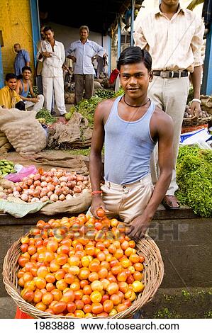 India, Old Delhi, Daryagani, Market With Locals Selling Fruit And Vegetables. View Large Photo Image Stock Photo - India, Old Delhi, Daryagani, Market With Locals Selling Fruit And Vegetables.. Fotosearch