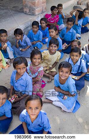 India, Rajasthan, Jodhpur, Rinawey Upper Primary School, Young Girls Sit In A Group Smiling. View Large Photo Image Stock Photograph - India, Rajasthan, Jodhpur, Rinawey Upper Primary School, Young Girls Sit In A Group Smiling.. Fotosearch