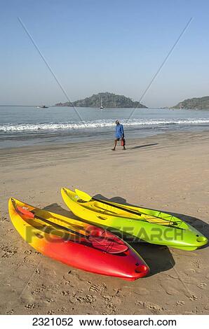 Stock Image - India, Sea Kayaks On Palolem Beach; Goa. Fotosearch