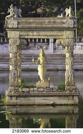 India, Tamil Nadu, Hindu Temple; Mahablipuram (Mamallarpuram), Statue depicting Hindu Deity View Large Photo Image Stock Photo - India, Tamil Nadu, Hindu Temple; Mahablipuram (Mamallarpuram), Statue depicting Hindu Deity. Fotosearch