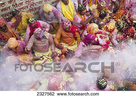 Stock Image - India, Uttar Pradesh, Lathmar Holi Celebrations; Barsana. Fotosearch