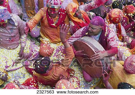 Stock Image - India, Uttar Pradesh, Lathmar Holi Celebrations; Barsana. Fotosearch