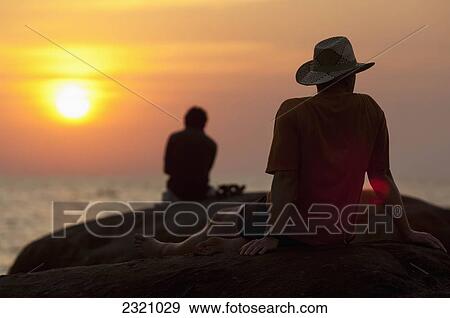 India, Watching Sunset On Palolem Beach; Goa View Large Photo Image Stock Photo - India, Watching Sunset On Palolem Beach; Goa. Fotosearch