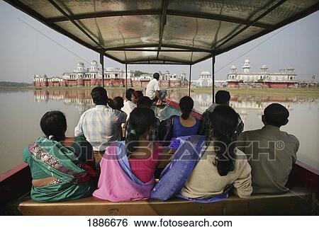 Indian Tourists Riding A Boat To Neermahal Palace And Lake View Large Photo Image Stock Photograph - Indian Tourists Riding A Boat To Neermahal Palace And Lake. Fotosearch