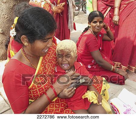 Indian woman and crying child; kanchipuram tamil nadu south india View Large Photo Image Stock Photograph - Indian woman and crying child; kanchipuram tamil nadu south india. Fotosearch