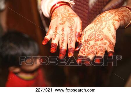 Indian woman with mehndi on hands; Mumbai, Maharashtra State, India View Large Photo Image Stock Image - Indian woman with mehndi on hands; Mumbai, Maharashtra State, India. Fotosearch