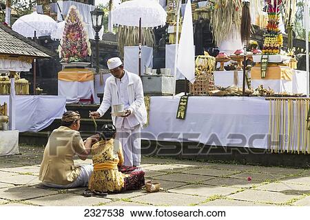 Stock Photo - Indonesia, Bali, biggest Hindu Temple in Bali located in Karangasem regency; Karangasem, Hindu devotees at Besakih Temple. Fotosearch