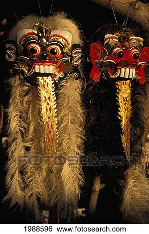 Stock Photograph - Indonesia, Bali, Closeup Of Barong Dance Masks Hanging. Fotosearch