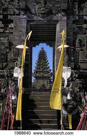 Stock Image - Indonesia, Bali, Hindu Style Temple, Looking Through Doorway. Fotosearch