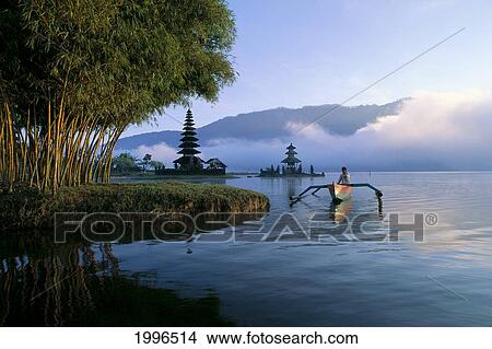 Picture - Indonesia, Bali, Lake Bratan, Ulu Danu Temple At Sunrise, Person In Canoe A62A. Fotosearch