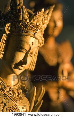 Stock Image - Indonesia, Bali, Statue Of An Indonesian Dancer.. Fotosearch