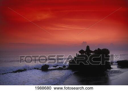 Indonesia, Bali, Taneh Lot Temple Silhouetted At Sunset, Red Sky View Large Photo Image Stock Image - Indonesia, Bali, Taneh Lot Temple Silhouetted At Sunset, Red Sky. Fotosearch