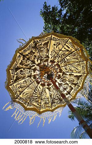 Indonesia, Bali, Temple Umbrella With Intricate Stencil Design View Large Photo Image Stock Photo - Indonesia, Bali, Temple Umbrella With Intricate Stencil Design. Fotosearch