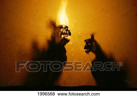 Indonesia, Bali, Wayan Kulit Shadow Puppets, Orange Fire A63G View Large Photo Image Stock Photo - Indonesia, Bali, Wayan Kulit Shadow Puppets, Orange Fire A63G. Fotosearch