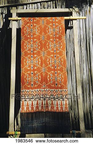 Indonesia, Ikat weaving in village; Sumba Island View Large Photo Image Stock Photograph - Indonesia, Ikat weaving in village; Sumba Island. Fotosearch