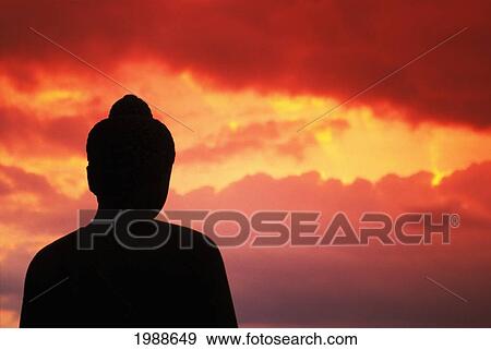 Indonesia, Java, Borobudur, Temple Relic, Buddhist Statue At Sunset, Silhouetted By Pink Sky View Large Photo Image Stock Photo - Indonesia, Java, Borobudur, Temple Relic, Buddhist Statue At Sunset, Silhouetted By Pink Sky. Fotosearch