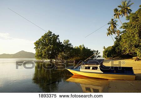 Indonesia, Sulawesi, Boat on Sandy Beach; Bunaken View Large Photo Image Stock Photography - Indonesia, Sulawesi, Boat on Sandy Beach; Bunaken. Fotosearch