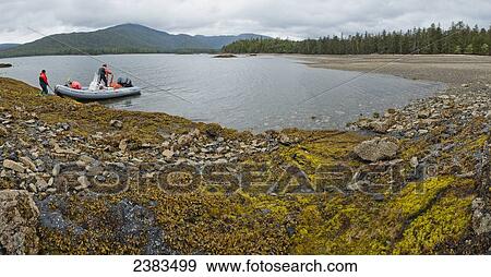Inflatable boat in harbour; Haida Gwaii, British Columbia, Canada View Large Photo Image Stock Photo - Inflatable boat in harbour; Haida Gwaii, British Columbia, Canada. Fotosearch