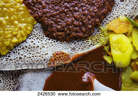 Injera, traditional Ethiopian food, with vegetarian fasting wat; Ethiopia View Large Photo Image Stock Image - Injera, traditional Ethiopian food, with vegetarian fasting wat; Ethiopia. Fotosearch