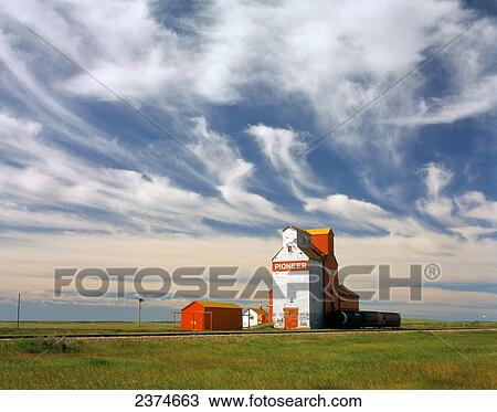 Inland grain terminal with railway in the prairies; Instow, Saskatchewan, Canada View Large Photo Image Stock Image - Inland grain terminal with railway in the prairies; Instow, Saskatchewan, Canada. Fotosearch