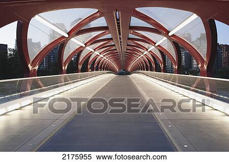 Stock Photography - Inside Red Bridge Over The Bow River At Twilight With Lights; Calgary Alberta Canada. Fotosearch