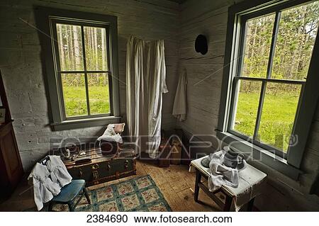 Stock Image - Inside rustic cabin at Old World Wisconsin; Eagle, Wisconsin, United States of America. Fotosearch