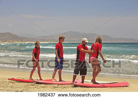 Stock Photo - Instructors And Students With Surf Lessons At Cerritos Beach; Todos Santos Baja California Sur Mexico. Fotosearch