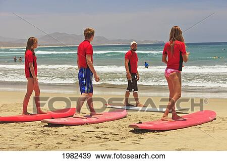 Stock Photo - Instructors And Students With Surf Lessons At Cerritos Beach; Todos Santos Baja California Sur Mexico. Fotosearch