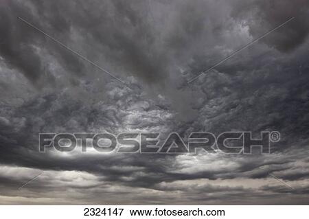 Stock Photo - Interesting clouds proceed a severe thunderstorm; Saskatchewan, Canada. Fotosearch