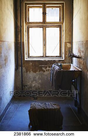 Stock Photograph - Interior cell of Auschwitz concentration camp block; Osweciem, Poland. Fotosearch
