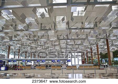 Interior of an airport terminal; Singapore View Large Photo Image Stock Photo - Interior of an airport terminal; Singapore. Fotosearch