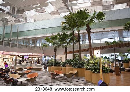 Stock Photo - Interior of an airport terminal; Singapore. Fotosearch