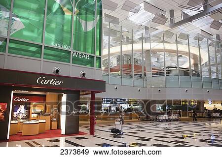 Interior of an airport terminal; Singapore View Large Photo Image Stock Photo - Interior of an airport terminal; Singapore. Fotosearch