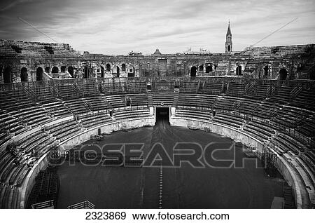 Stock Photo - Interior of an ancient Roman amphitheatre; Nimes, France. Fotosearch