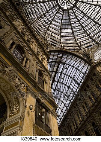 Stock Image - Interior Of Historic Gallery With Magnificent Dome, Low Angle View; Naples, Italy. Fotosearch