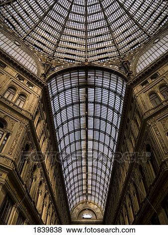 Stock Photo - Interior Of Historic Gallery With Magnificent Dome, Low Angle View; Naples, Italy. Fotosearch