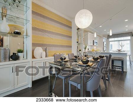 Stock Photo - Interior Of Modern Kitchen And Dining Area; Surrey, British Columbia, Canada. Fotosearch