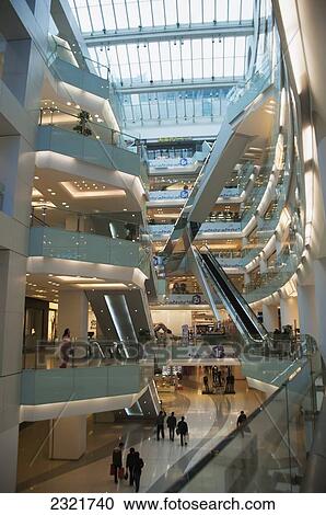 Stock Image - Interior of multi-level shopping mall; Beijing, China. Fotosearch