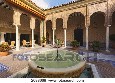 Interior Patio Of Parador Alcazar Del Rey Don Pedro; Carmona Seville Province Spain View Large Photo Image Stock Photo - Interior Patio Of Parador Alcazar Del Rey Don Pedro; Carmona Seville Province Spain. Fotosearch