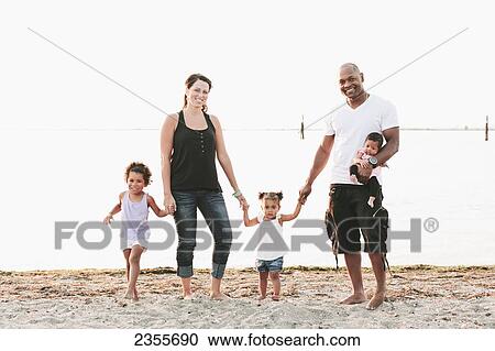 Interracial Family On The Beach; British Columbia, Canada View Large Photo Image Stock Image - Interracial Family On The Beach; British Columbia, Canada. Fotosearch