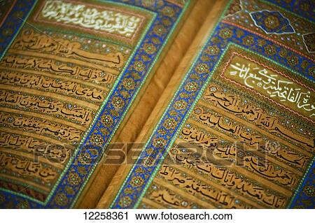 Intricate text of an old Koran at Brunei's Dar al-Salam's Islamic Museum; Bandar Seri Begawan, Brunei View Large Photo Image Stock Image - Intricate text of an old Koran at Brunei's Dar al-Salam's Islamic Museum; Bandar Seri Begawan, Brunei. Fotosearch
