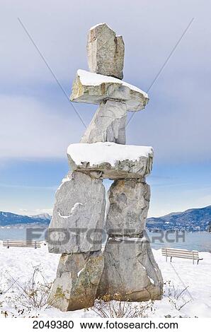 Stock Image - Inukshuk At English Bay In Downtown Vancouver, British Columbia. Fotosearch