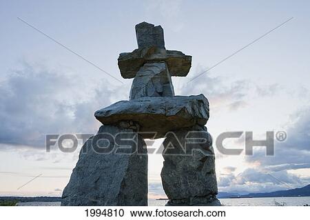 Inukshuk In English Bay At Dusk, Vancouver, British Columbia, Canada View Large Photo Image Stock Image - Inukshuk In English Bay At Dusk, Vancouver, British Columbia, Canada. Fotosearch